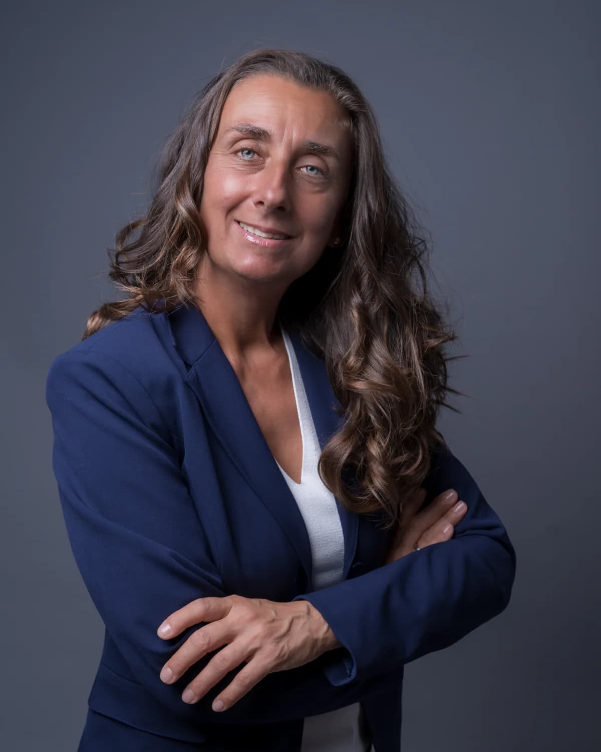 Businessporträt einer Frau im blauen Blazer